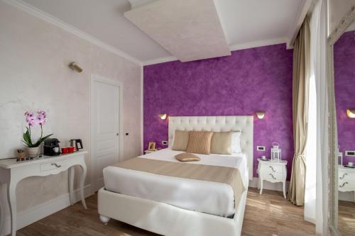 Letto o letti in una camera di I Fiumi Di Navona