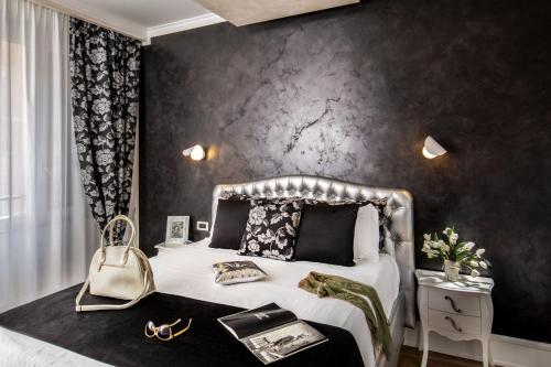 Letto o letti in una camera di I Fiumi Di Navona