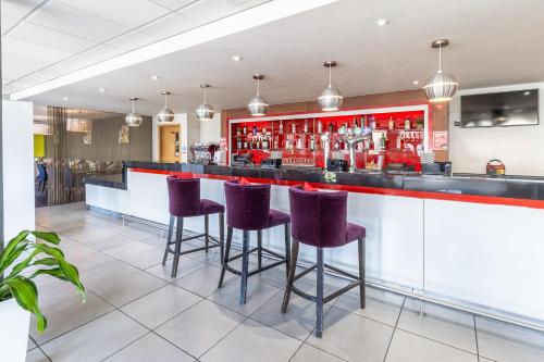 
a large kitchen with a large counter top at Park Inn by Radisson Peterborough in Peterborough
