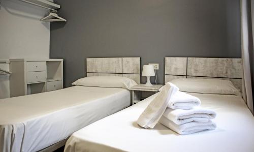 Postel nebo postele na pokoji v ubytování BUTIK Almería Centro