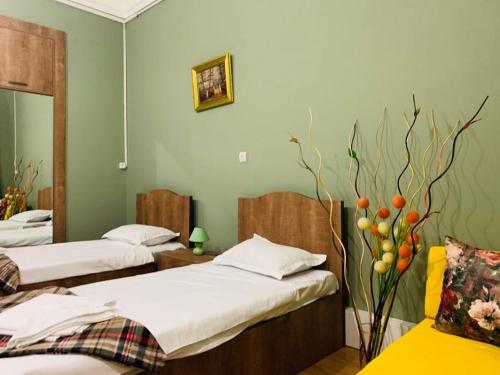 Ένα ή περισσότερα κρεβάτια σε δωμάτιο στο City Guli Hostel