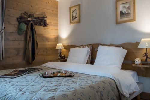 Postel nebo postele na pokoji v ubytování CGH Résidences & Spas Les Clarines