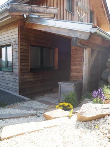 an outside view of a building with a patio at Klippitzhimmel in Klippitztorl