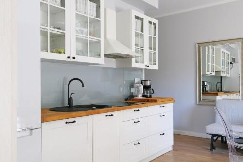Ett kök eller pentry på Pegaz Apartments by Baltic Home