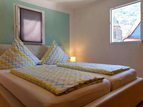 Un pat sau paturi într-o cameră la Anna´s Häuschen
