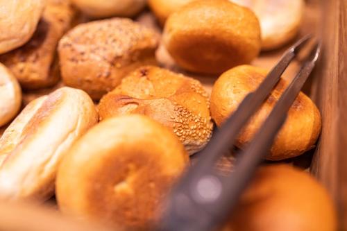a bunch of different types of donuts in a box at Haus Neunaber in Norderney