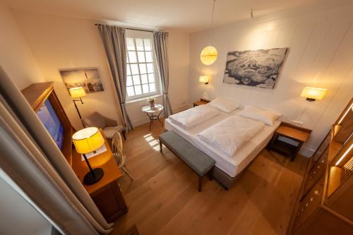 En eller flere senge i et værelse på 4-Sterne Superior Erlebnishotel Krønasår, Europa-Park Erlebnis-Resort