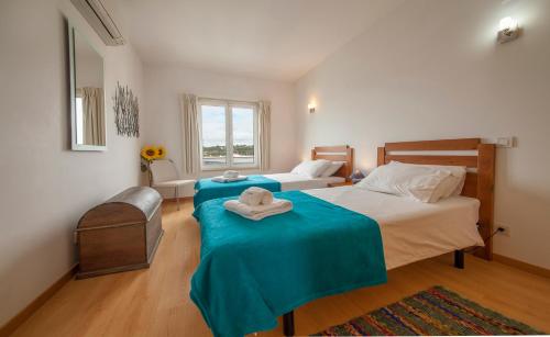 Säng eller sängar i ett rum på B40 - Marina View Apartment