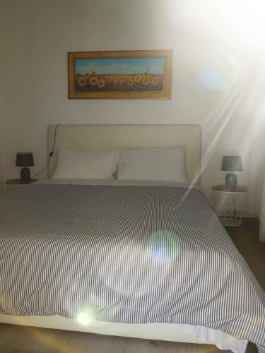 Una cama o camas en una habitación de Angolo di isa