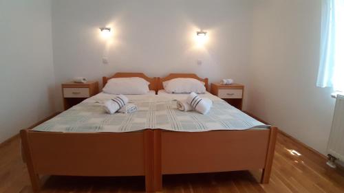 Postel nebo postele na pokoji v ubytování Miro Apartment