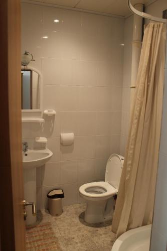 Ванная комната в Жемчужина