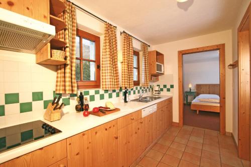 a kitchen with a sink and a counter top at Haus Elisabeth in Obergurgl