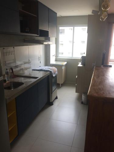 A cozinha ou cozinha compacta de Conforto - VOG Torres do Sul Ilhéus