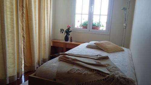 Ένα ή περισσότερα κρεβάτια σε δωμάτιο στο Casa Shalom