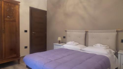 Postel nebo postele na pokoji v ubytování Casa Furore