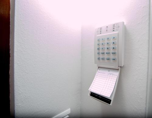 a soap dispenser is hanging on a wall at Apartman Emir 1 in Sarajevo