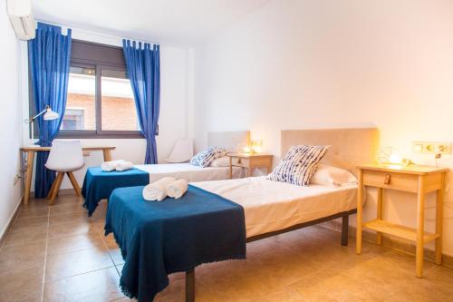 Posteľ alebo postele v izbe v ubytovaní AL27 Duplex de diseño a 250 metros de la playa