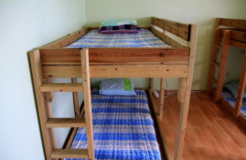 a bunk bed with two beds in a room at Minjoonggak in Seogwipo