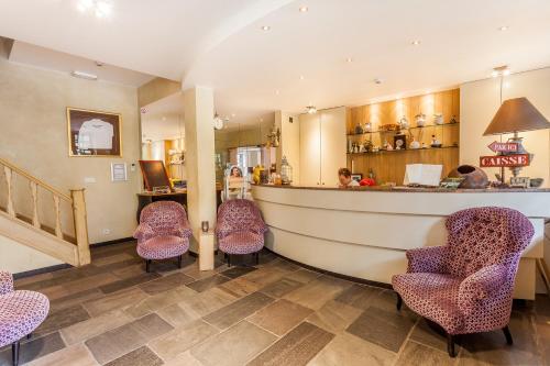 Posezení v ubytování Hotel Fief De Liboichant