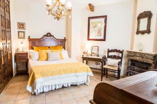 מיטה או מיטות בחדר ב-Mafloras Suites El Bosque