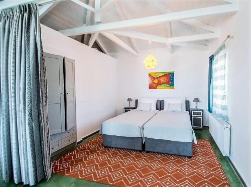 a bedroom with a bed in a room at Villa Dafni in Agios Nikolaos