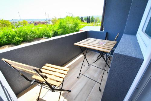 Vulsa Apartmaniにあるバルコニーまたはテラス