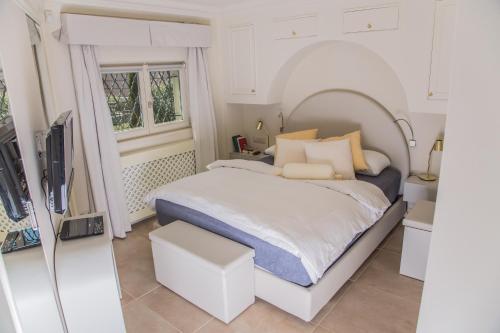 Postel nebo postele na pokoji v ubytování President Boutique Apartment