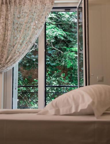 Ένα ή περισσότερα κρεβάτια σε δωμάτιο στο Ανθέμιο