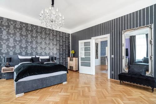 Sophies Place Yppenplatz - Imperial Lifestyle City Apartments Vienna Parking tesisinde bir odada yatak veya yataklar