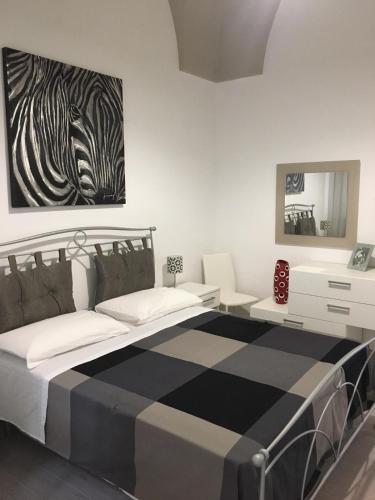 Postel nebo postele na pokoji v ubytování Guest House Nonna Lena