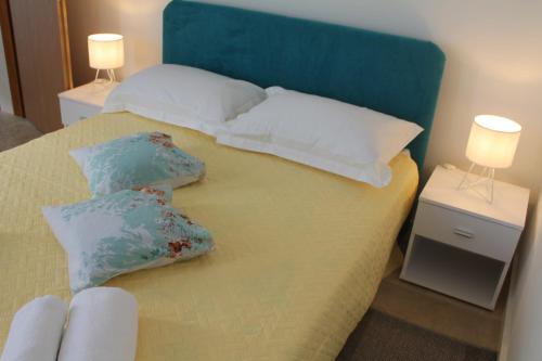 Posteľ alebo postele v izbe v ubytovaní Apartman Lapis