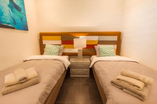 Letto o letti in una camera di Villa Sol Paraiso