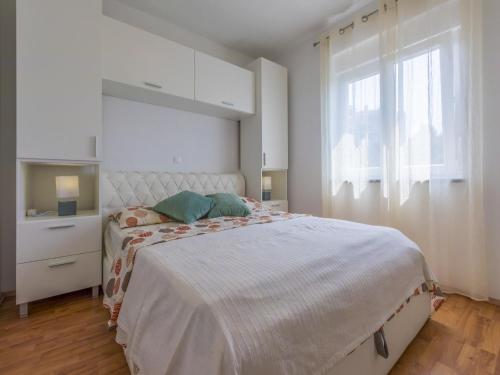 Postel nebo postele na pokoji v ubytování Apartment Cherry