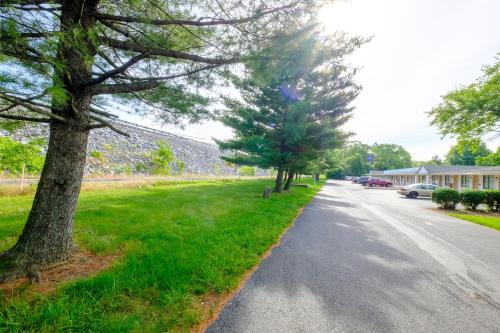 a street with trees on the side of a road at American Inn in Carlisle
