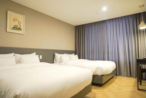 Hotel Daoomにあるベッド