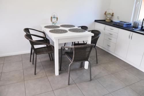 Cuisine ou kitchenette dans l'établissement Domki Sara Piotr Maszke