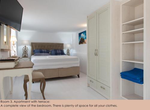 Ένα ή περισσότερα κρεβάτια σε δωμάτιο στο Pension Afroditi