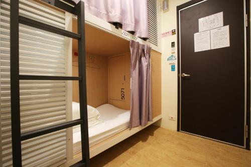 Postel nebo postele na pokoji v ubytování Loosha Hostel