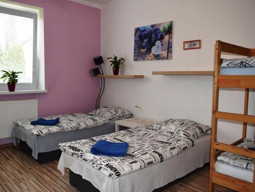 Ένα ή περισσότερα κρεβάτια σε δωμάτιο στο Apartman Martin