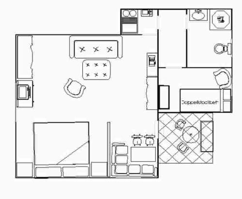 - un plan d'étage d'une chambre avec salle de bains dans l'établissement Ferienwohnung Kretzschmar, à Kirnitzschtal