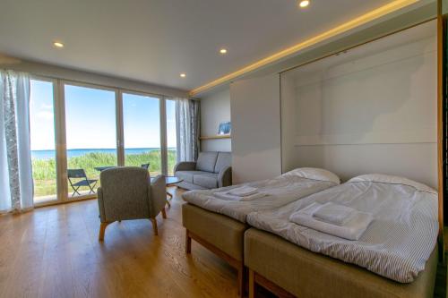 Postel nebo postele na pokoji v ubytování Modern Sea View Apartments by Villa Kuus Sõlme