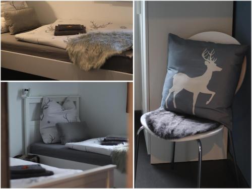 Habitación con cama y silla con almohada de ciervo en Eifel Apartments, en Esch