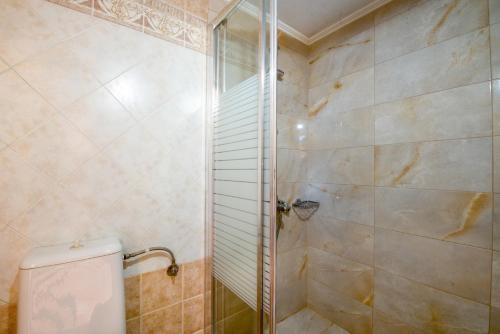 Ванна кімната в Skandalis Apartments