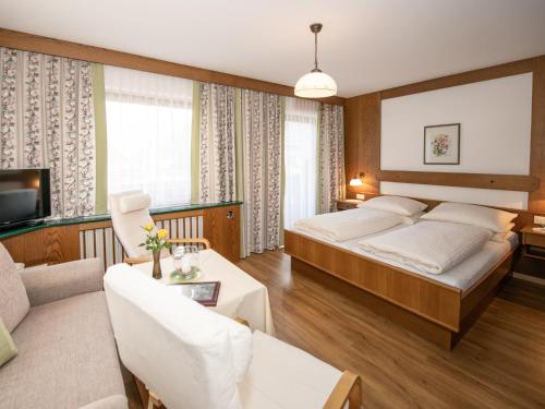 Posteľ alebo postele v izbe v ubytovaní Pension und Appartement Weinschreiber