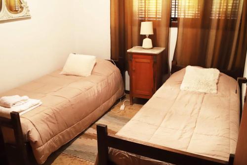 Llit o llits en una habitació de Casa Chacras