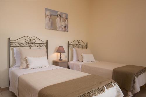 Кровать или кровати в номере The Four Seasons House City Villa with Pool
