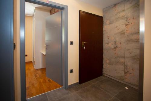 a hallway with a door leading to a room at Apartment Edgar in Makarska