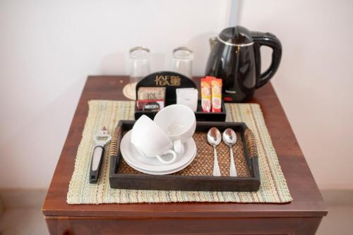 Melheim Kandy Villasにあるコーヒーまたはお茶