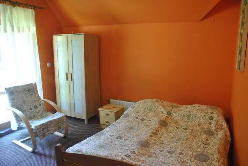Cama o camas de una habitación en Pod Kasztanem