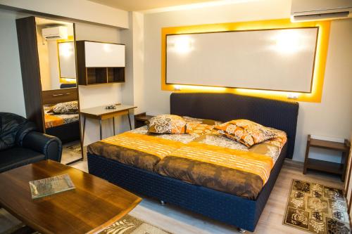 Posteľ alebo postele v izbe v ubytovaní Apartament Calea Bucuresti
